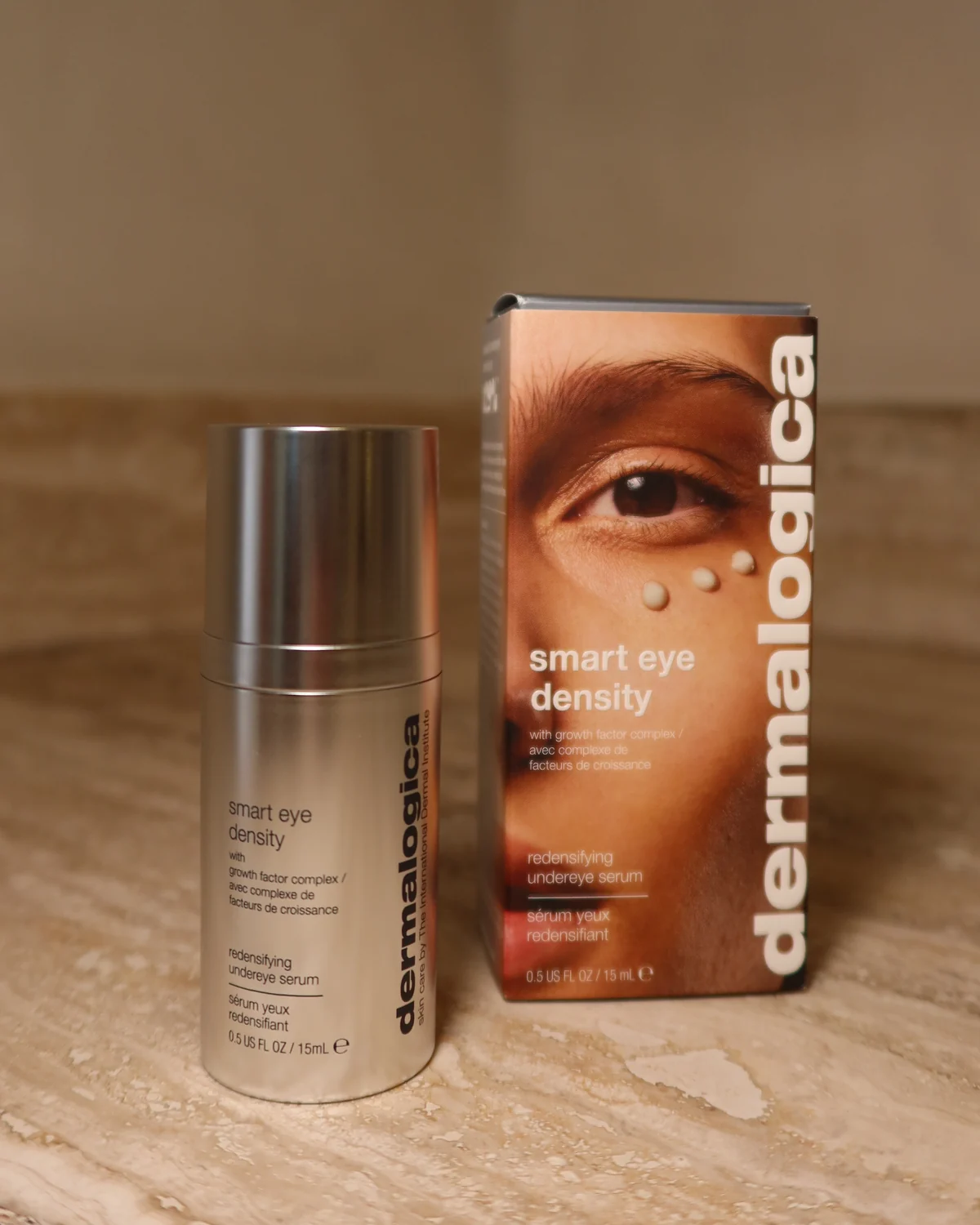 The Dermalogica Smart Eye Density redensifying undereye serum, 15ml, beside its carton